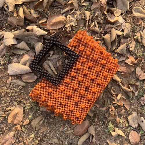 Zeyna [orange with brown handle]